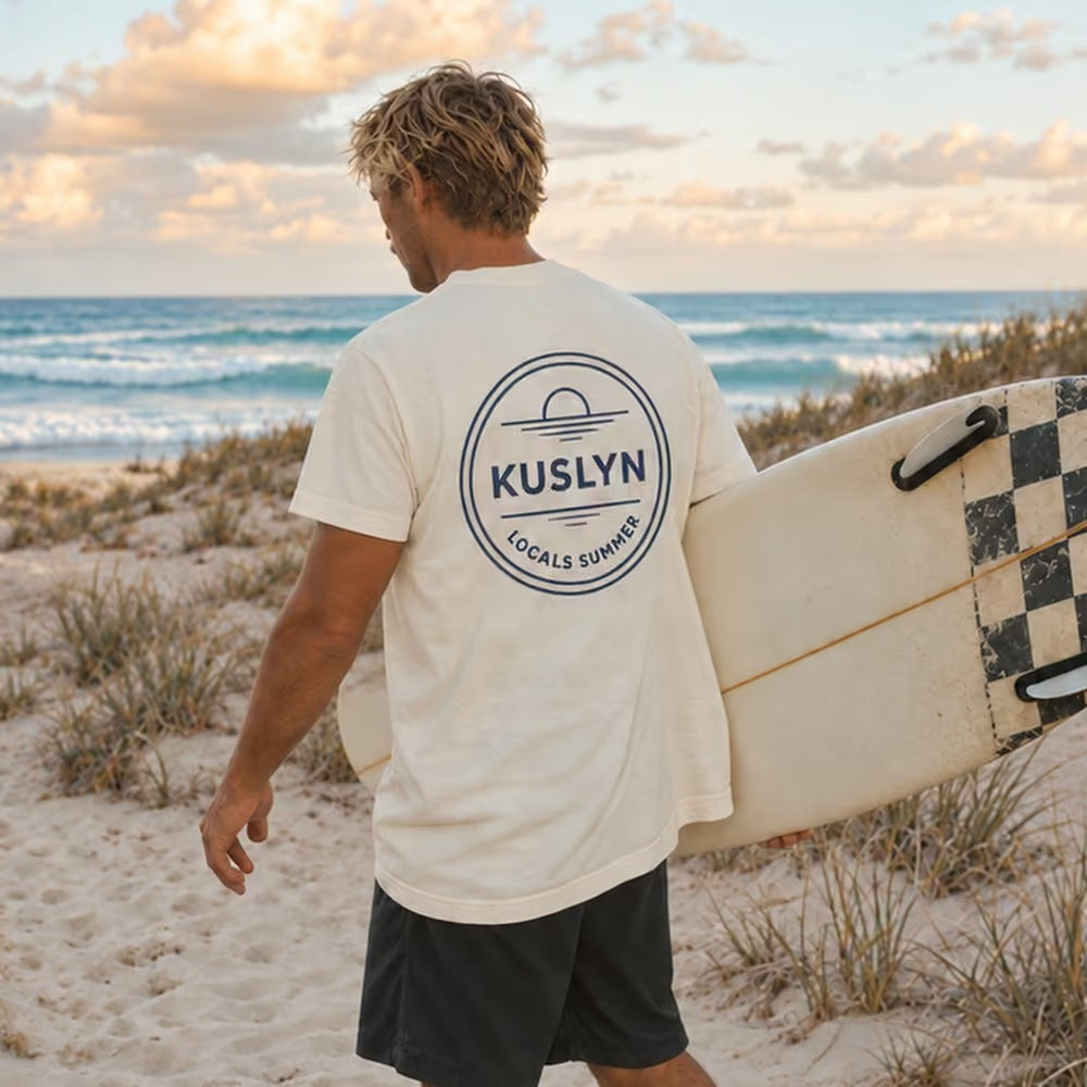 Locals Summer Tee - Faded Cream - back, worn on the beach